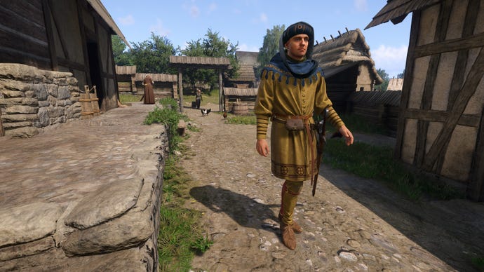 A man in noble finery sauntering through a village in Kingdom Come: Deliverance 2