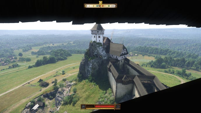 A view of an imposing hilltop castle from one of the castle's towers in Kingdom Come: Deliverance 2