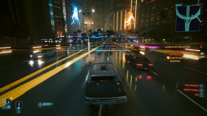 A nighttime driving scene in Cyberpunk 2077: Phantom Liberty, with DLSS 3.5 Ray Reconstruction switched on.