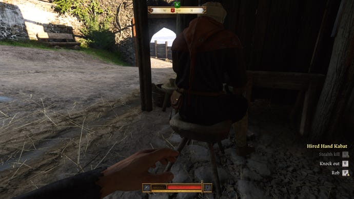 The player in Kingdom Come: Deliverance 2 prepares to pickpocket Hired Hand Kabat from behind.