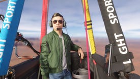 A proud, bleary-eyed pilot stands in a hot air balloon.