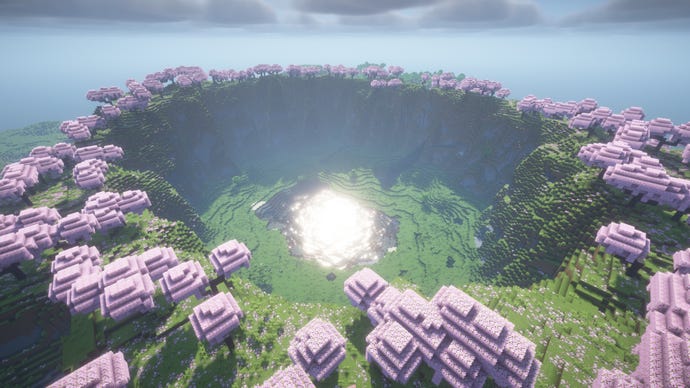 Minecraft screenshot of the 'cherry valley' seed showing a valley surrounded by cherry blossom trees.