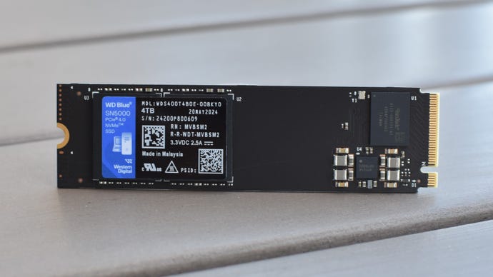 The WD Blue SN5000 SSD on a table.